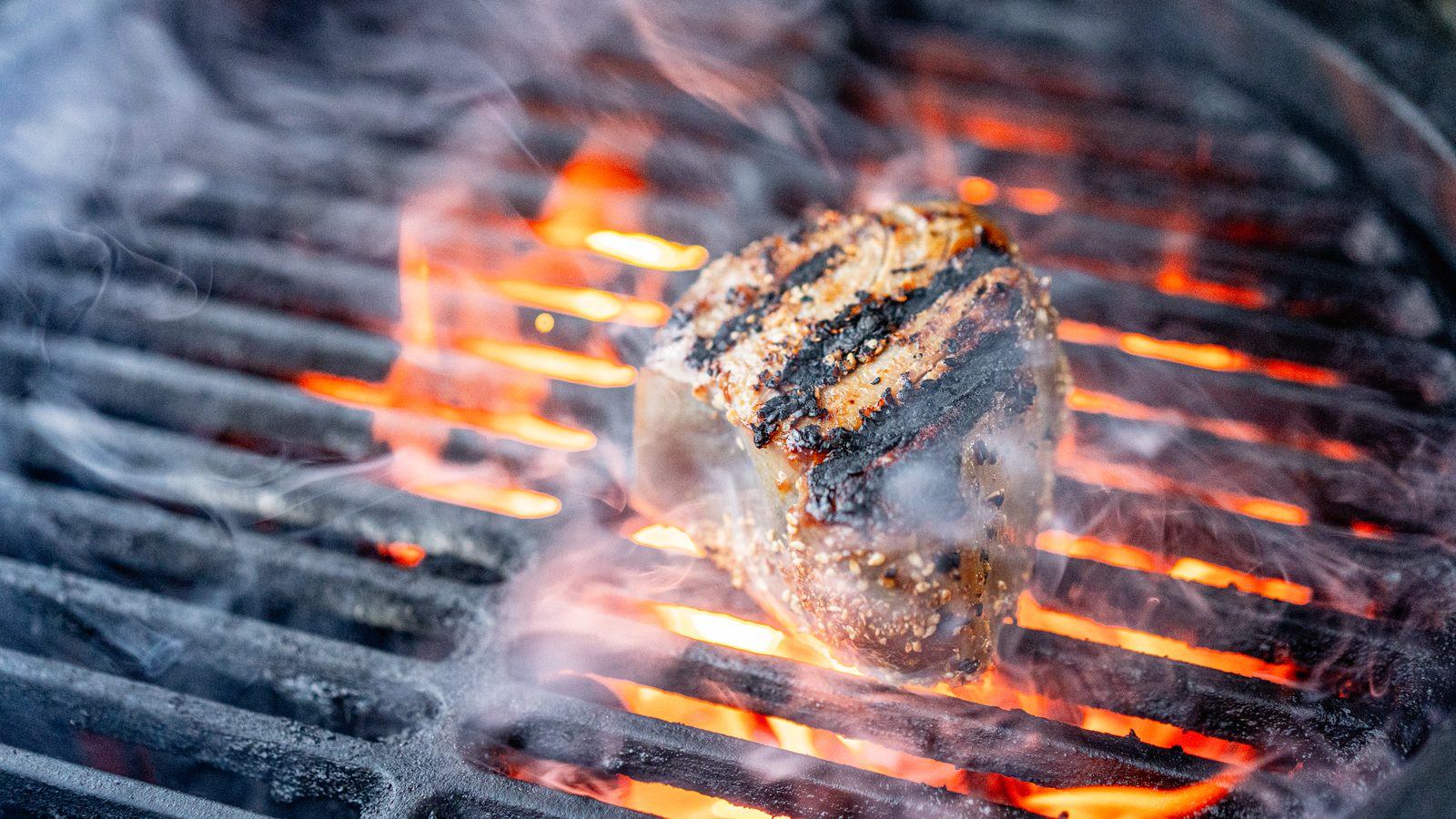 Steak searing over the coals